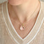 TNS52 BASE METAL NECKLACE WITH PETAL CHARM