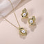 TES69 BRASS TEXTURED LEAF EARRING WITH PEARL&CZ