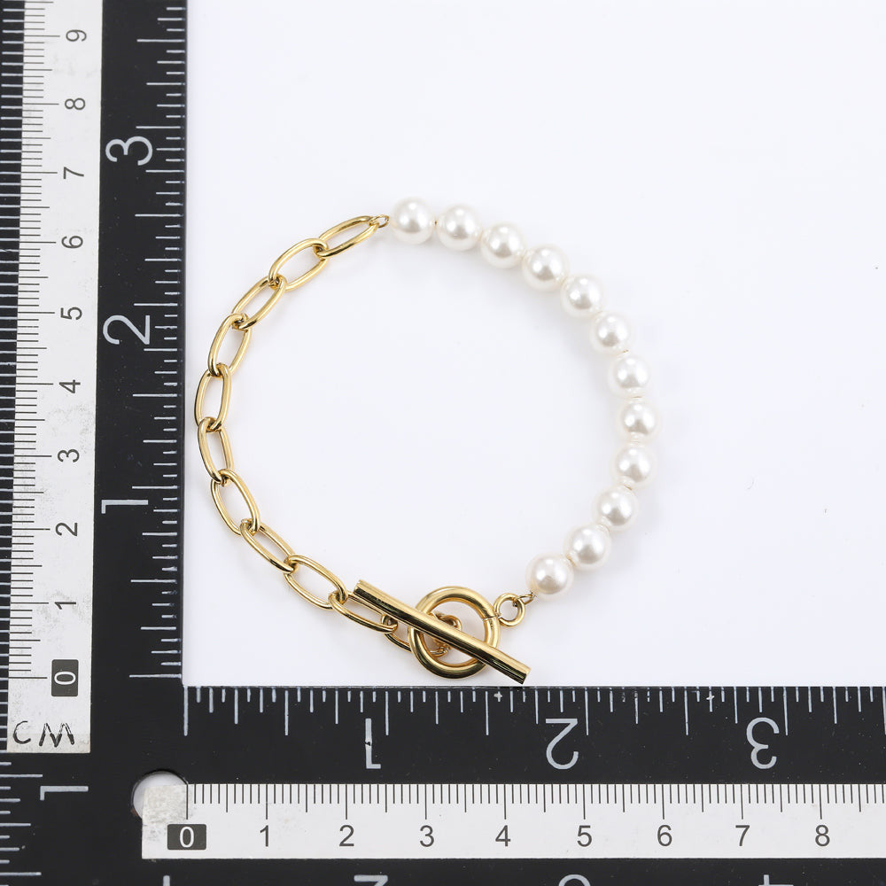 BSS881 STAINLESS STEEL BRACELET WITH SHELL PEARL AAB CO..