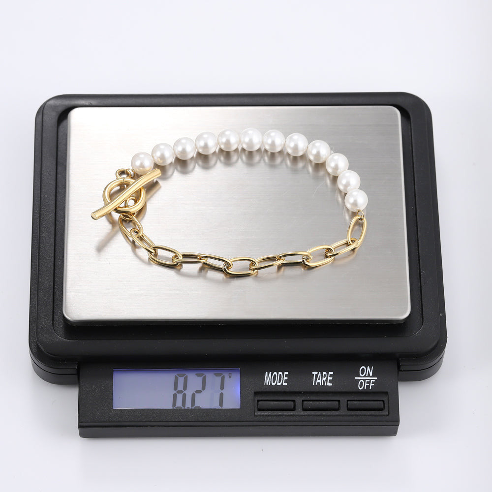 BSS881 STAINLESS STEEL BRACELET WITH SHELL PEARL AAB CO..