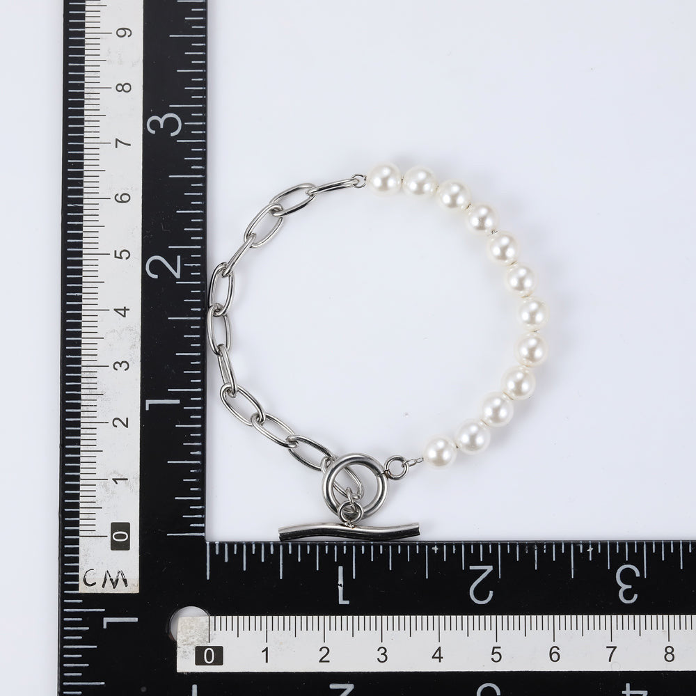 BSS881 STAINLESS STEEL BRACELET WITH SHELL PEARL AAB CO..