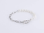 BSS881 STAINLESS STEEL BRACELET WITH SHELL PEARL AAB CO..