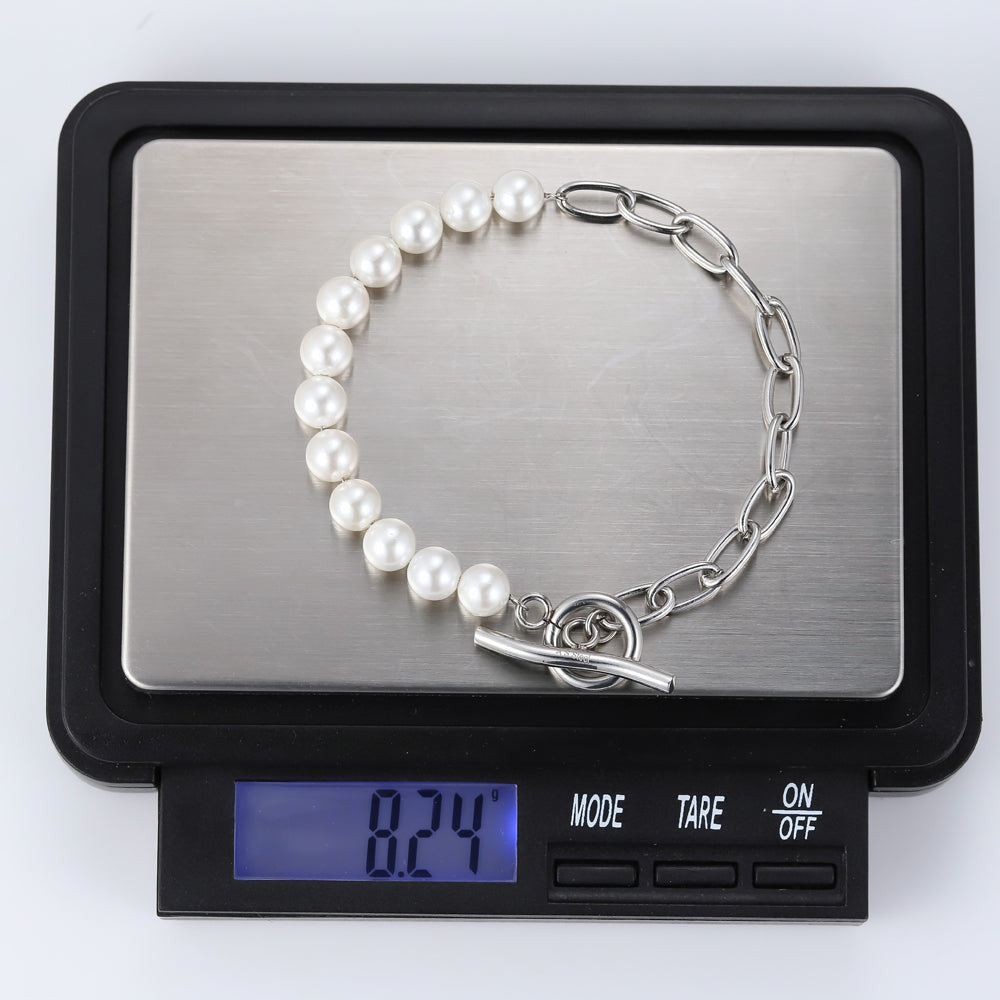 BSS881 STAINLESS STEEL BRACELET WITH SHELL PEARL AAB CO..