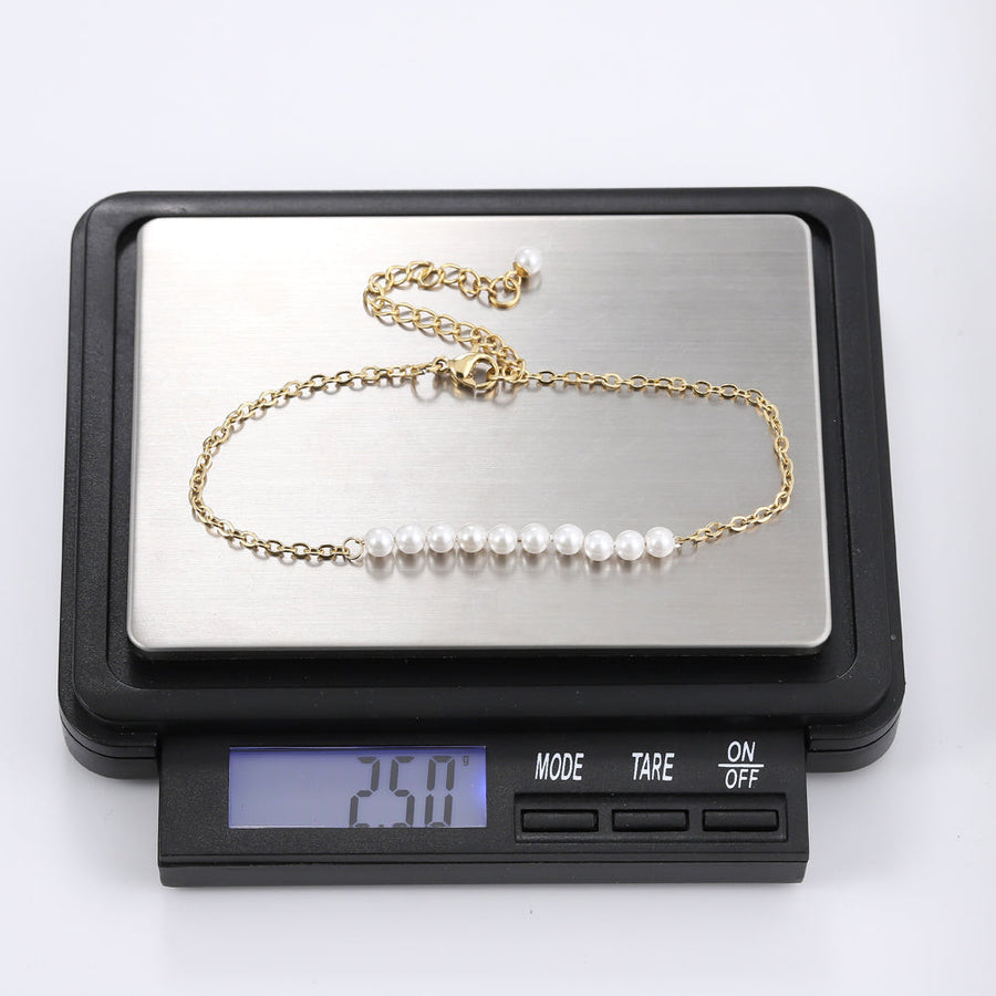 BSS883 STAINLESS STEEL BRACELET WITH SHELL PEARL AAB CO..