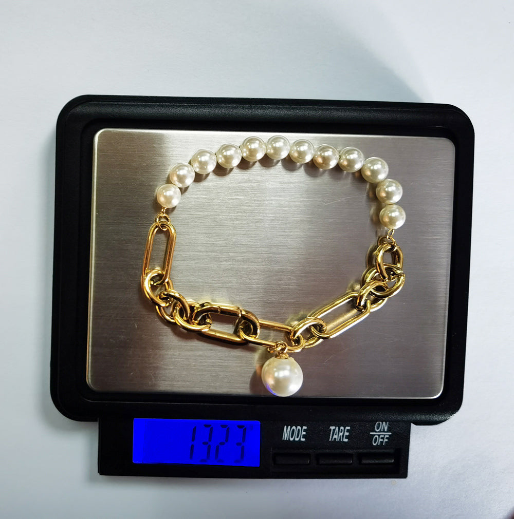 BSS884 STAINLESS STEEL BRACELET WITH SHELL PEARL AAB CO..