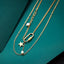MNSS23 STAINLESS STEEL MULTI CHAIN NECKLACE WITH PEARL AAB CO..