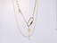 MNSS23 STAINLESS STEEL MULTI CHAIN NECKLACE WITH PEARL AAB CO..